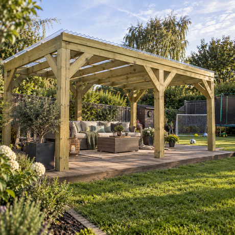 Wooden pergola featuring six huge, chunky pressure treated posts and a clear transparent roof situated in a UK family garden.